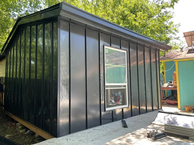 Black standing seam metal wall panels for Metal Roof Installation in Pembroke Pines