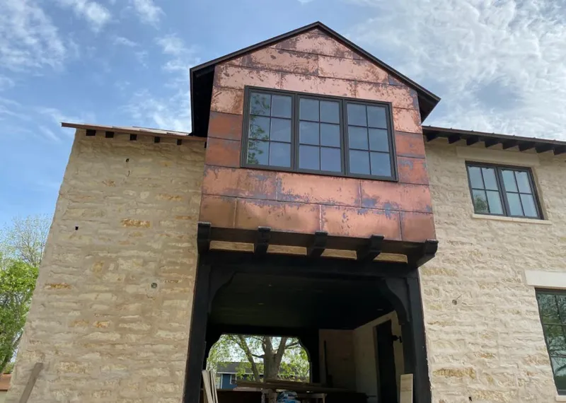 Copper metal panel facade on a stone building for Metal Roof Coating in Pembroke Pines